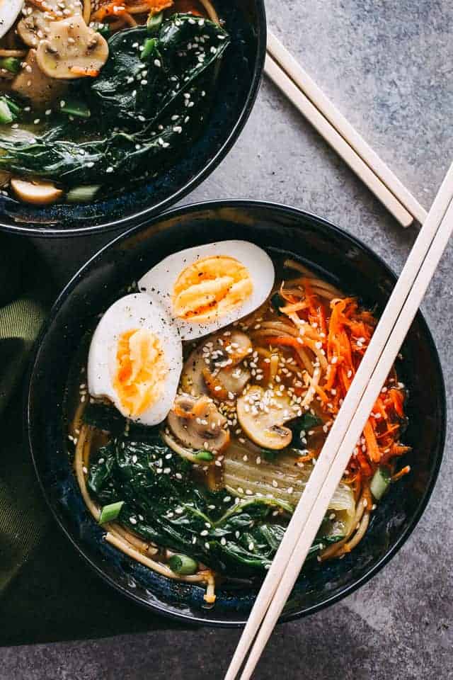 Easy Soba Noodle Soup served in black bowls and topped with chopsticks