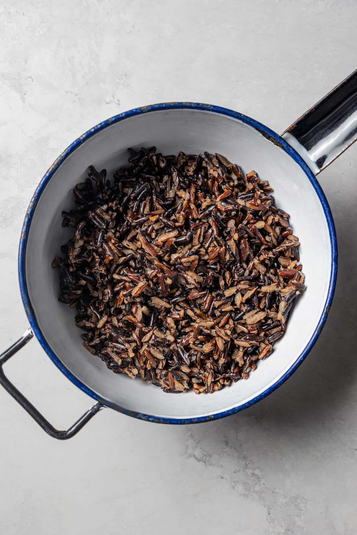 Wild rice in a saucepan.