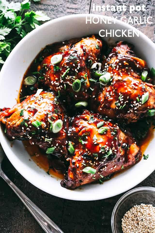 Instant Pot Honey Garlic Chicken is sweet, savory, tender, and oh-so-juicy! Cooked in an Instant Pot with an amazing honey garlic sauce, this dinner is ready in just 30 minutes! Serving Instant Pot Honey Garlic Chicken in a white bowl.
