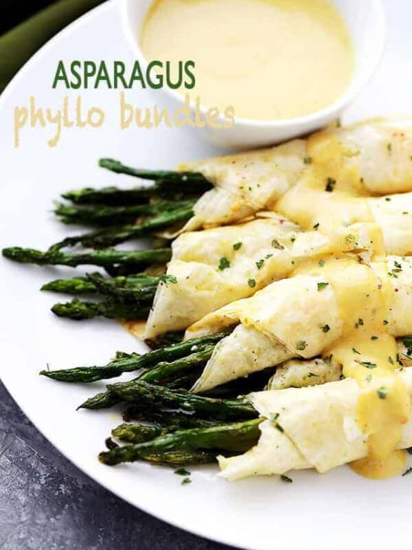 Asparagus wrapped in phyllo bundles and served with a side of honey mustard sauce.