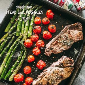 Steak and Veggies Sheet Pan Dinner - Perfectly seasoned sirloin steak, tender asparagus, and cherry tomatoes prepared together on just one sheet pan.