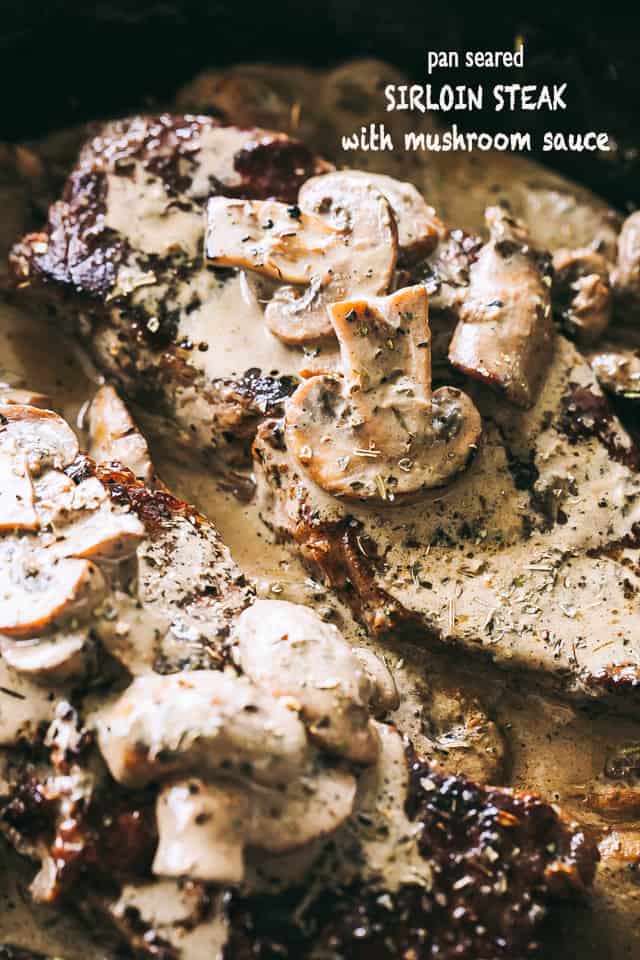 Side shot image of Steak topped with Mushroom Sauce.