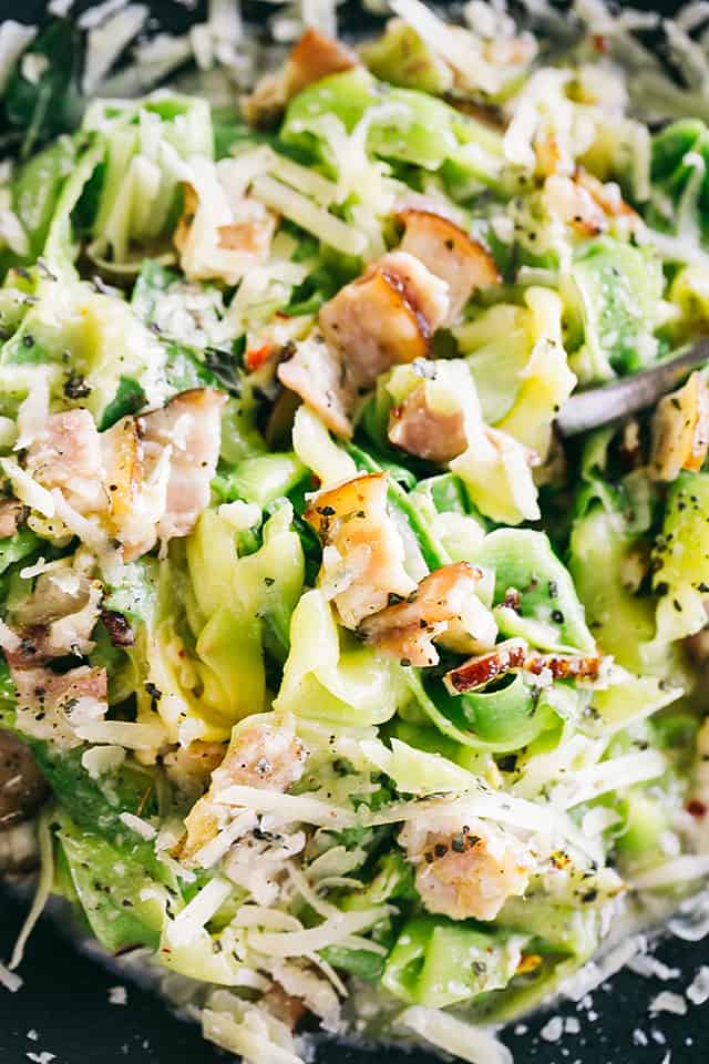 Pasta Carbonara with Zucchini Noodles - Healthy, lightened up version of the classic pasta carbonara prepared with delicious zucchini noodles, pan fried pancetta, and an irresistible creamy parmesan sauce.
