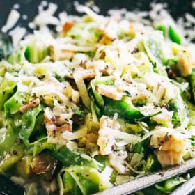 Pasta Carbonara with Zucchini Noodles - Healthy, lightened up version of the classic pasta carbonara prepared with delicious zucchini noodles, pan fried pancetta, and an irresistible creamy parmesan sauce.