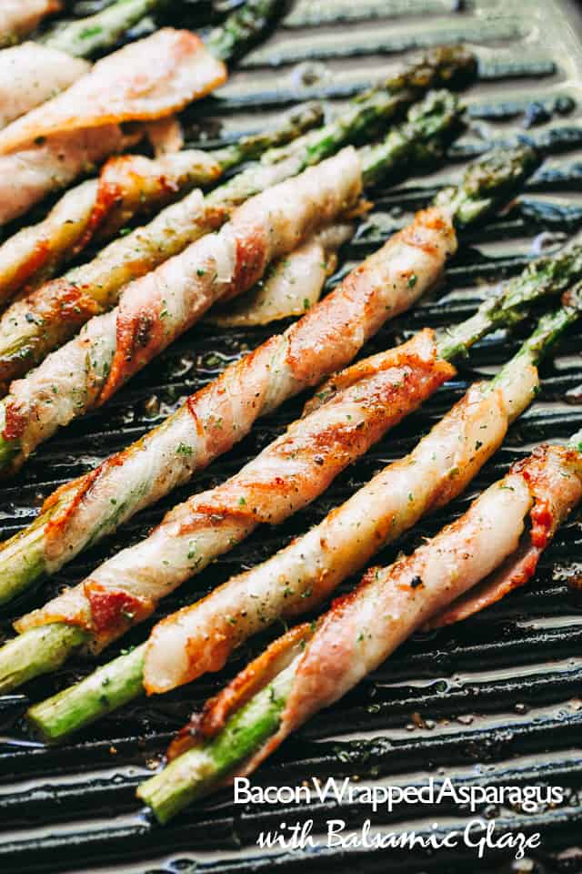 bacon wrapped asparagus on a grill pan.