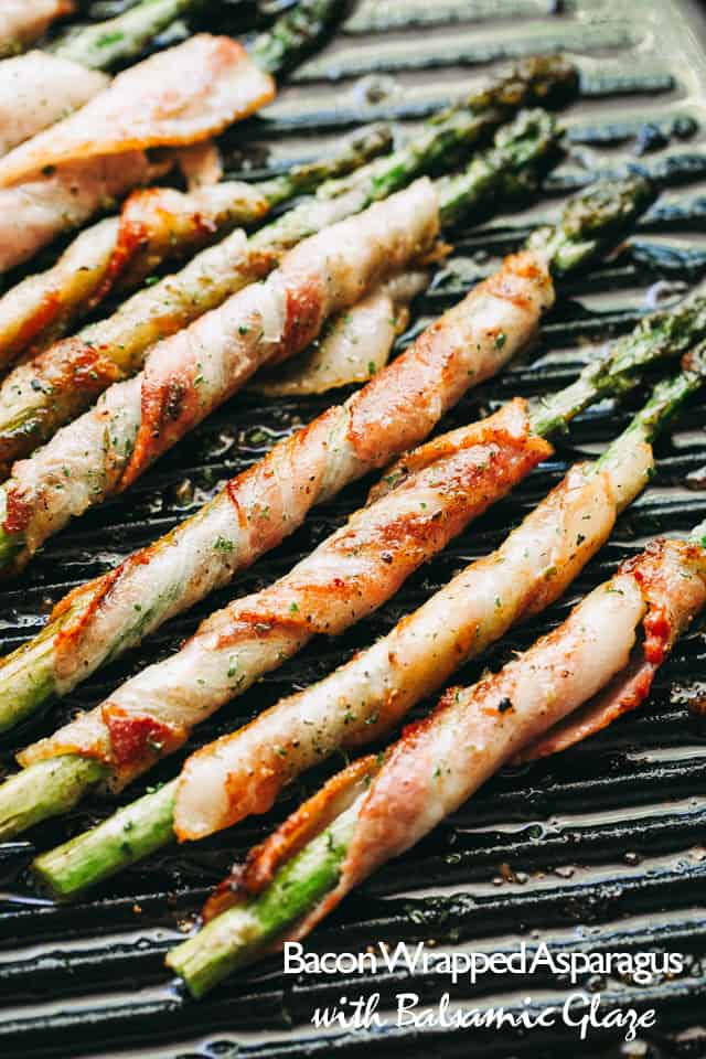 Bacon wrapped asparagus on a pan