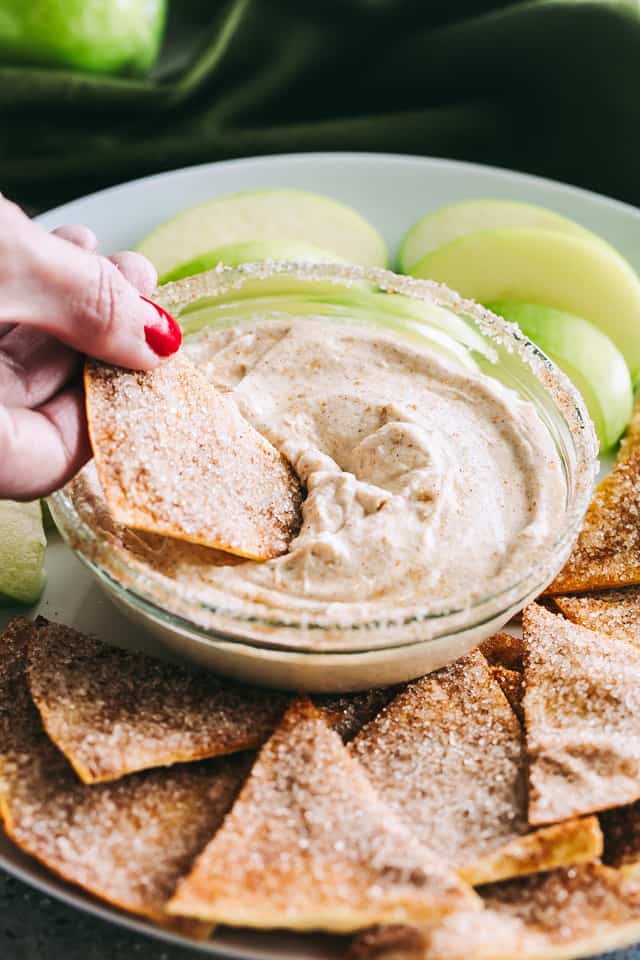 Skinny Churro Cream Cheese Fruit Dip - Lightened-up creamy fruit dip loaded with that amazing cinnamon sugar churros flavor that is sure to satisfy your cheesecake cravings!