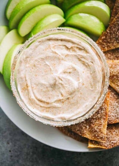 Skinny Churro Cream Cheese Fruit Dip - Lightened-up creamy fruit dip loaded with that amazing cinnamon sugar churros flavor that is sure to satisfy your cheesecake cravings!