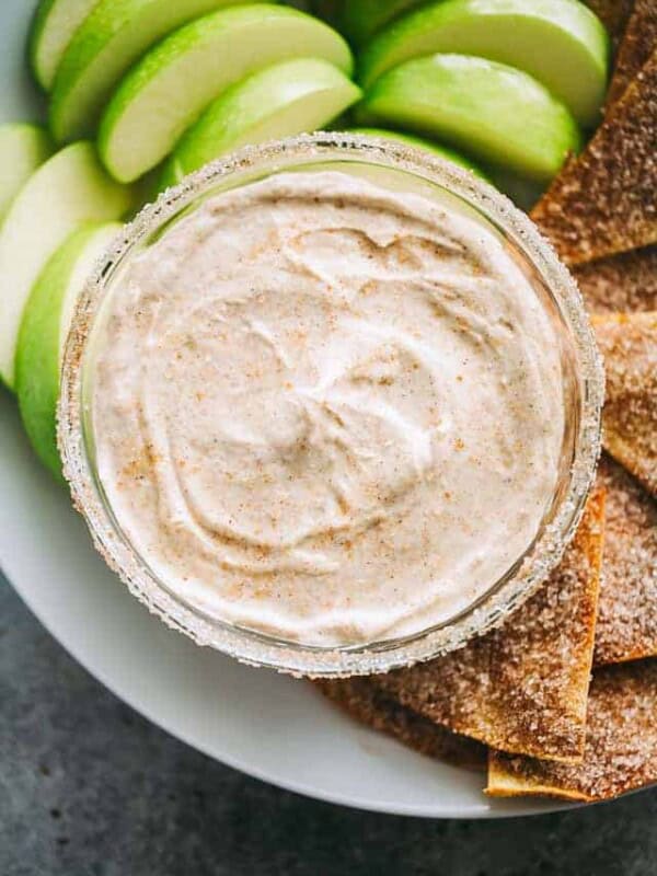 Skinny Churro Cream Cheese Fruit Dip - Lightened-up creamy fruit dip loaded with that amazing cinnamon sugar churros flavor that is sure to satisfy your cheesecake cravings!