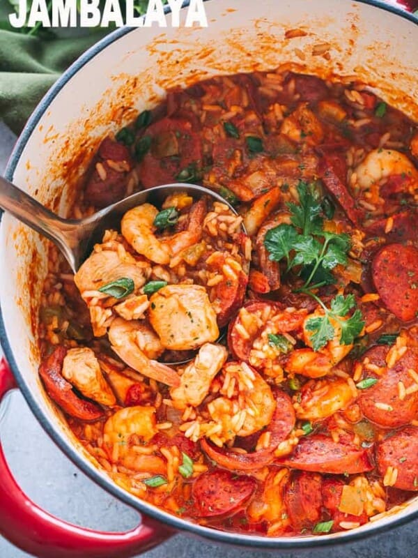 Jambalaya Recipe - Easy, tasty, one pot recipe for Jambalaya prepared with rice, chicken, shrimp, and sausages. Whip up this Southern favorite in just 30 minutes and get ready for a Mardi Gras dinner that the whole family will love! 