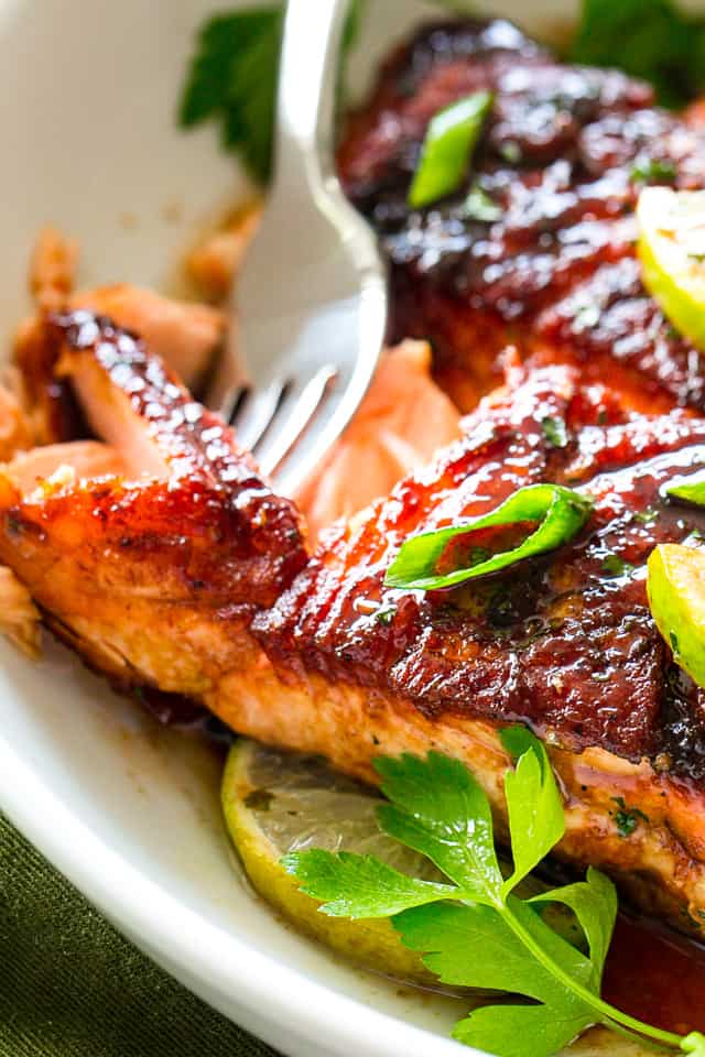 Close-up photo of Brown Sugar Salmon with a fork flaking out a bite.