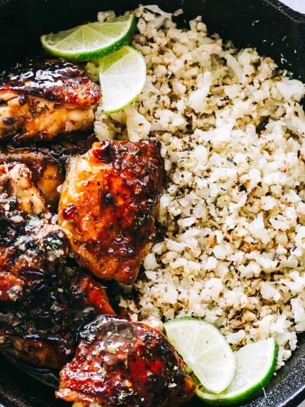 Honey Sriracha Chicken with Cauliflower Rice Recipe - Flavor-loaded, sweet and spicy honey sriracha chicken served with a delicious side of cauliflower rice. 