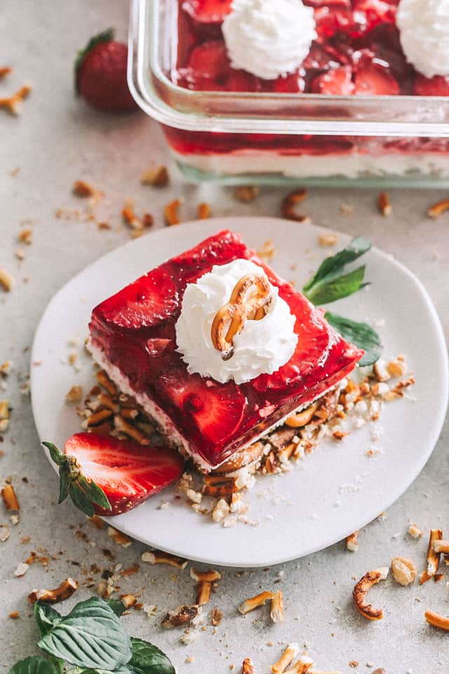 Strawberry Pretzel Dessert square served on a small dish.