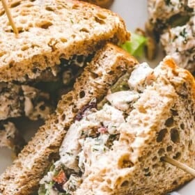 Creamy Dill Chicken Salad with Nuts and Cranberries - Easy, delicious, and wonderfully creamy chicken salad packed with nuts and cranberries mixed in a zesty blend of yogurt, mayo, and dill. 