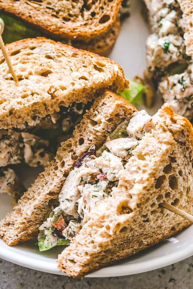 Halved sandwiches filled with Creamy Dill Chicken Salad 
