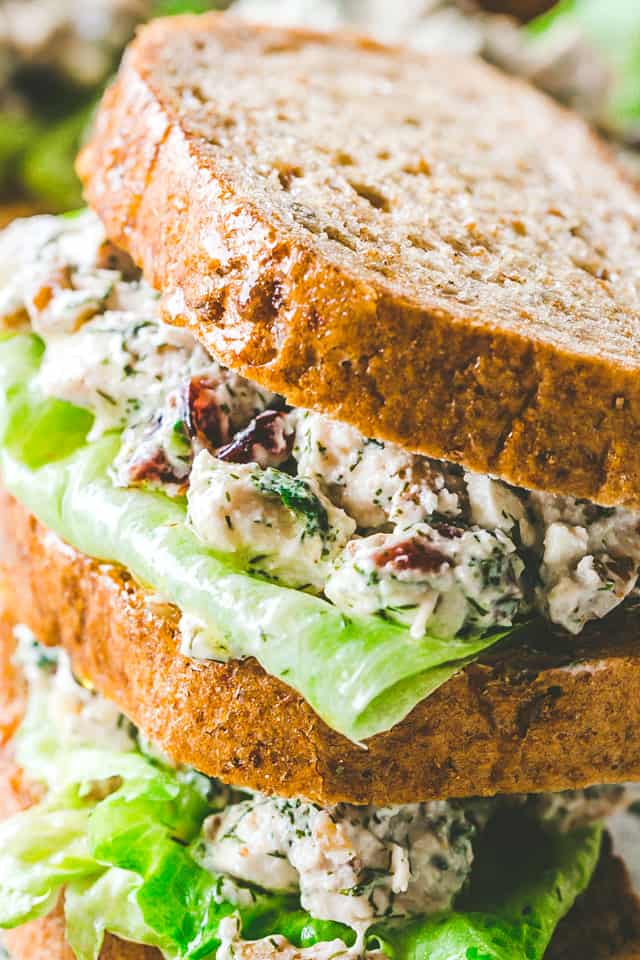 Stack of two creamy chicken salad sandwiches.