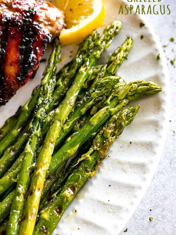 Grilled Asparagus Recipe - Grilled spears of fresh asparagus prepared with just a few ingredients, plus a sprinkle of parmesan cheese and a squeeze of lemon juice.