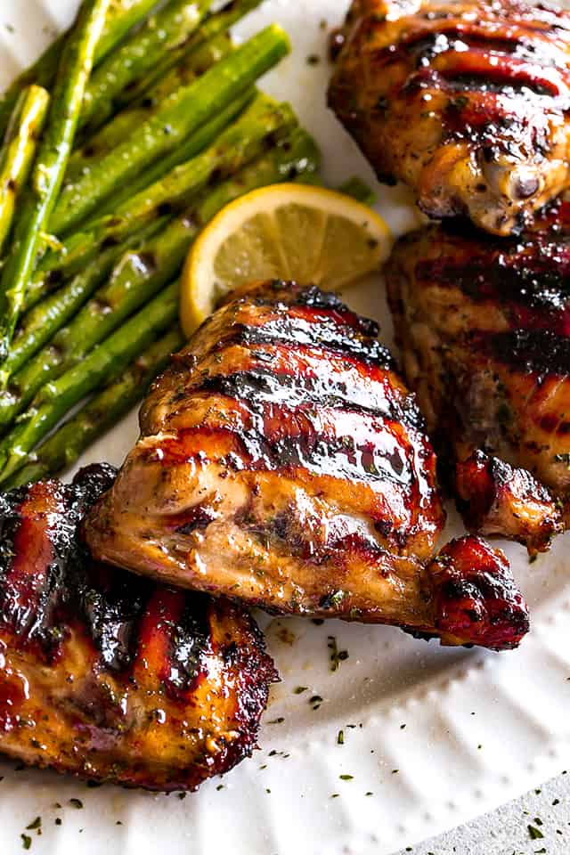 Grilled Chicken Thighs with Brown Sugar Glaze - Juicy, savory-sweet brown sugar glazed chicken thighs grilled to a tender perfection! 
