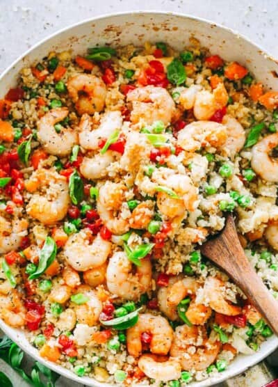 Shrimp Fried Cauliflower Rice - Skip the takeout and make this amazing, low carb "fried rice" meal right at home in just 20 minutes! 