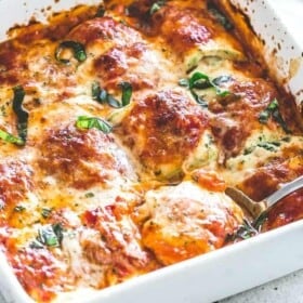 Zucchini Lasagna Roll Ups - Zucchini slices rolled up around a delicious ricotta filling, baked in tomato sauce and topped with cheese. A healthier, low carb option that's not only delicious, but also very easy and quick to make.