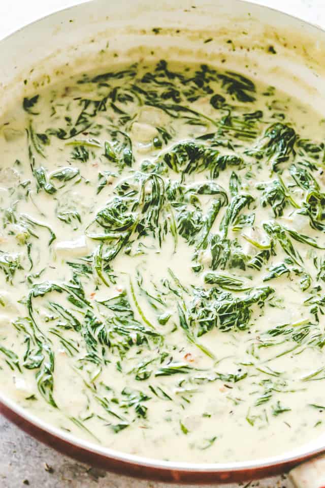 Creamed Spinach cooking in skillet