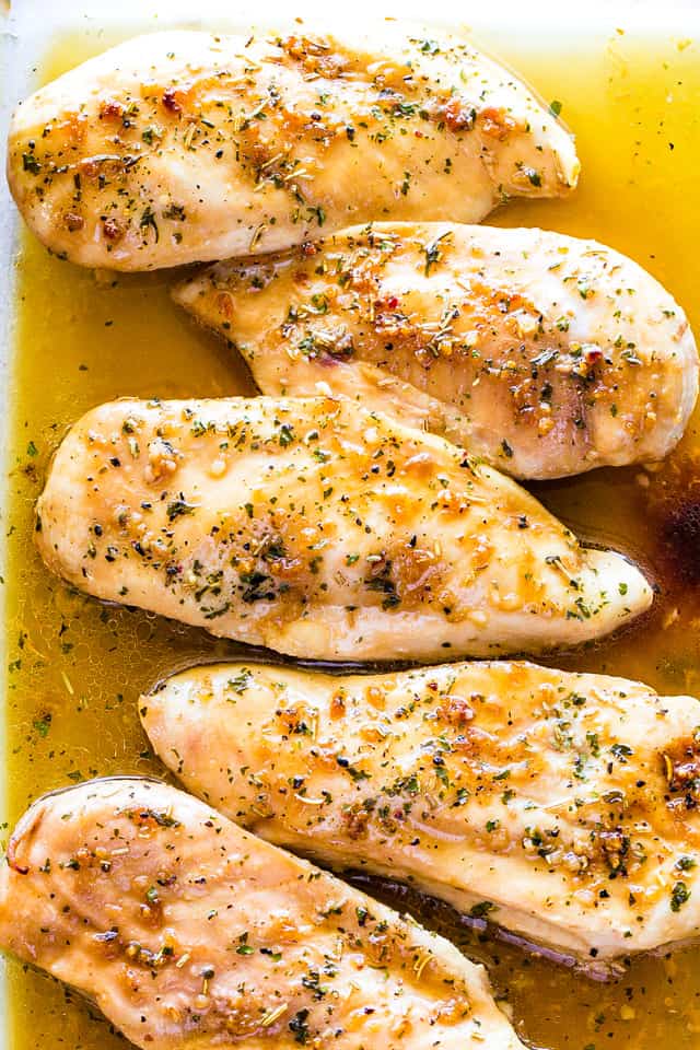 Garlic Brown Sugar Baked Chicken - Juicy, beyond DELICIOUS oven baked chicken breasts full of flavor with just a handful of ingredients and on the table in 30 minutes!