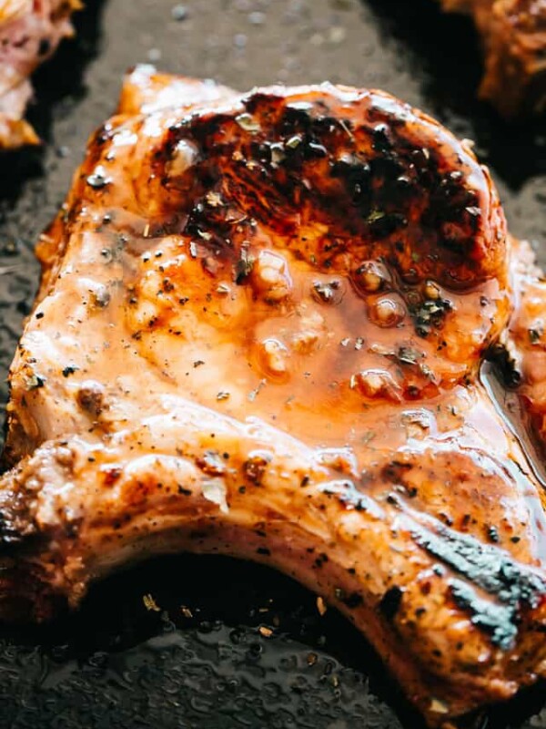 Close up of a honey garlic pork chop on a sheet pan.