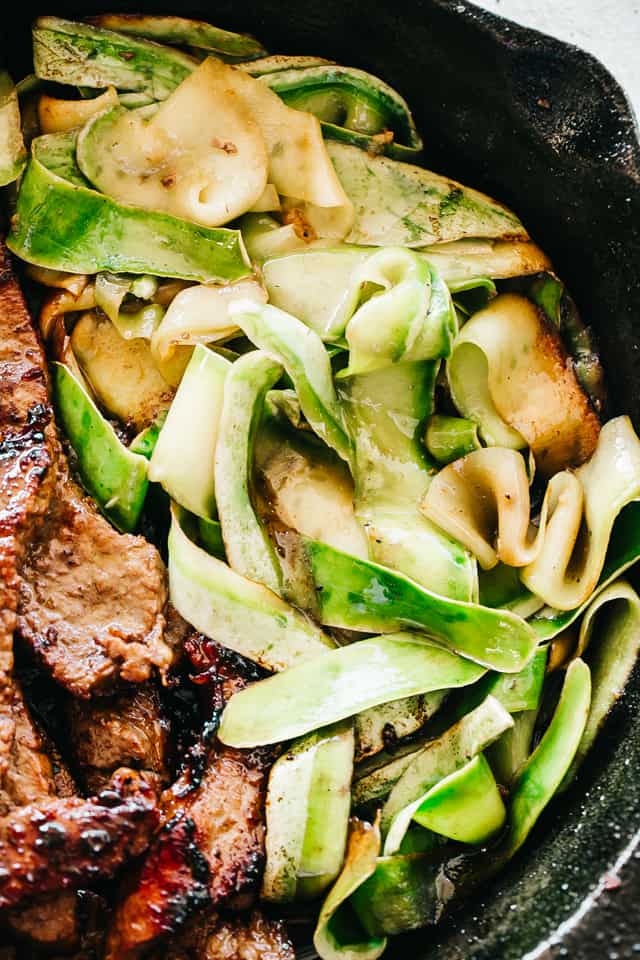 Steak Stir Fry with Zucchini Noodles - Intensely flavorful and wonderfully delicious Stir Fry Steak and Zucchini Noodles prepared in just one pan for a quick low carb meal that you'll go back to again and again! 