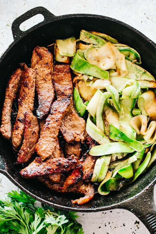 Steak Stir Fry with Zucchini Noodles - Intensely flavorful and wonderfully delicious Stir Fry Steak and Zucchini Noodles prepared in just one pan for a quick low carb meal that you'll go back to again and again! 