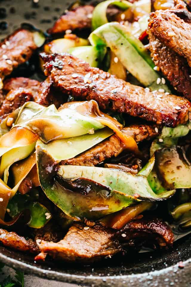 Steak Stir Fry with Zucchini Noodles - Intensely flavorful and wonderfully delicious Stir Fry Steak and Zucchini Noodles prepared in just one pan for a quick low carb meal that you'll go back to again and again! 