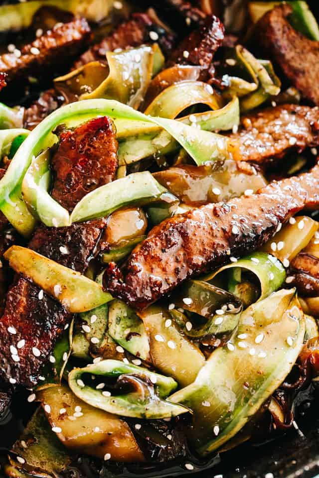 Steak Stir Fry with Zucchini Noodles - Intensely flavorful and wonderfully delicious Stir Fry Steak and Zucchini Noodles prepared in just one pan for a quick low carb meal that you'll go back to again and again! 