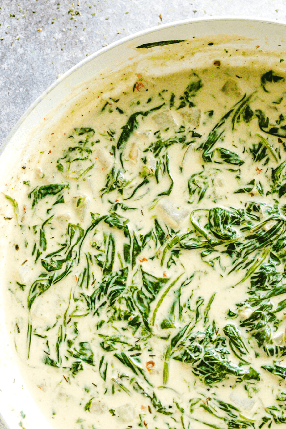 cooked spinach in creamy melted cream cheese mixture