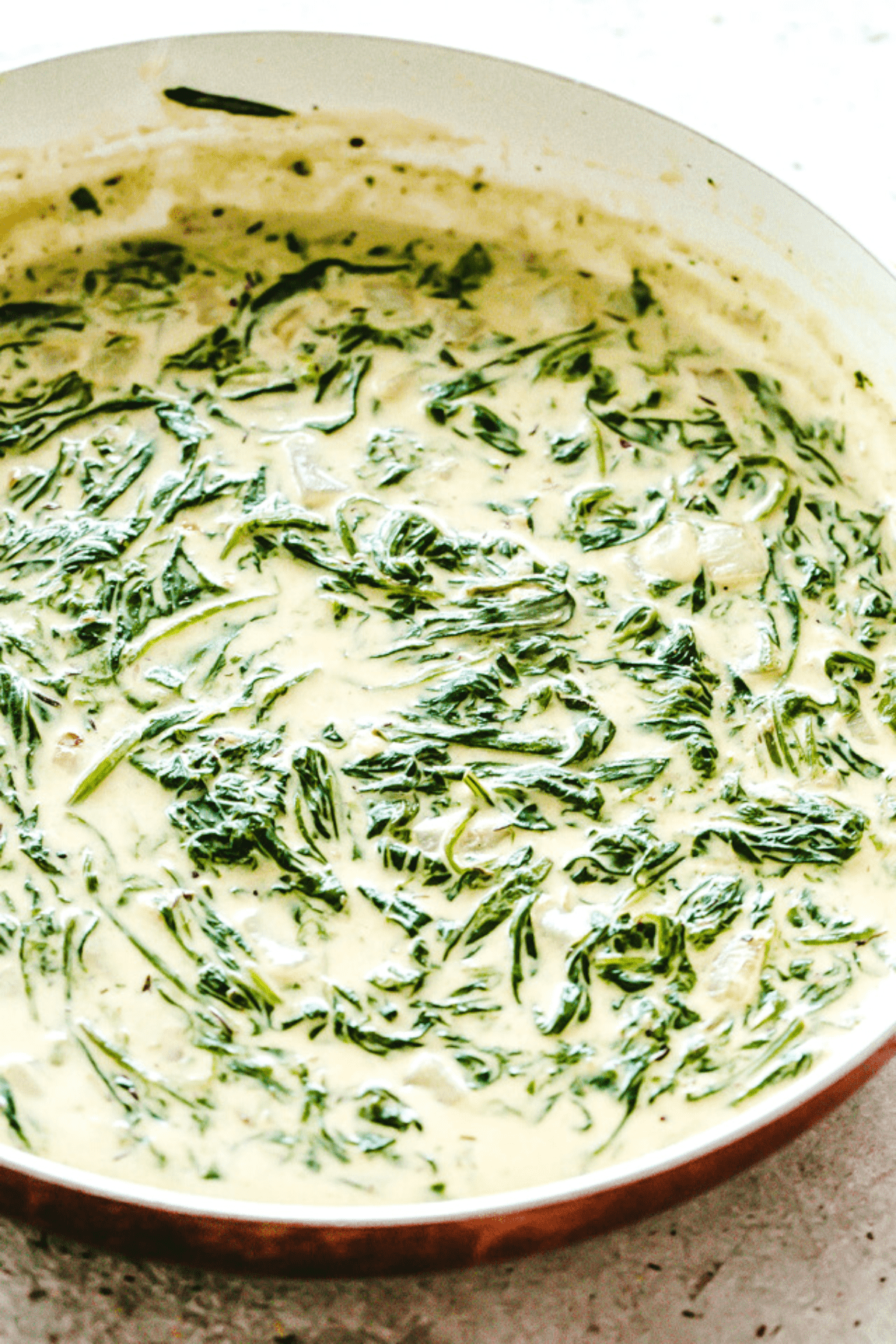 Creamed Spinach in a skillet