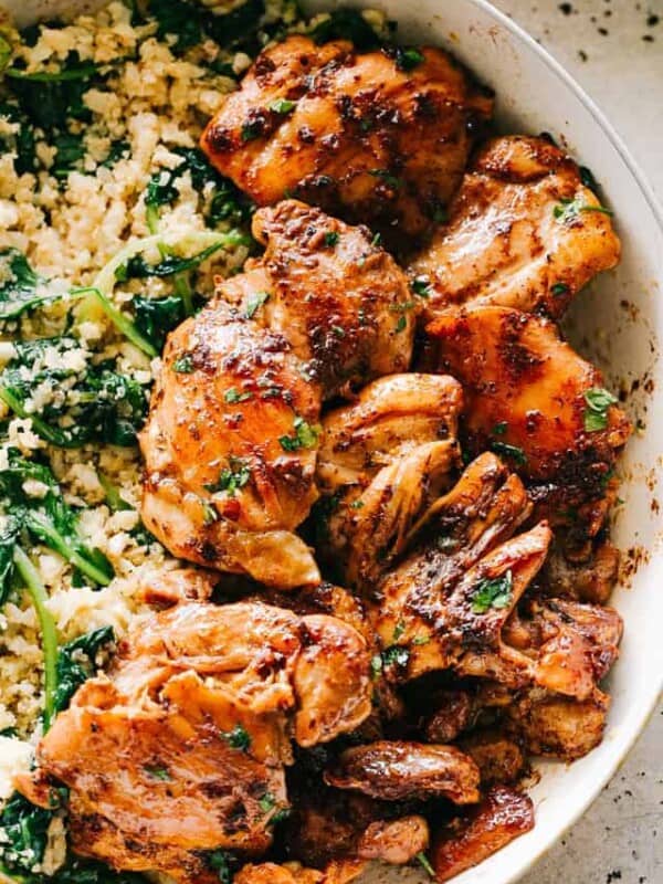 Juicy Stove Top Chicken Thighs - Perfectly golden, tender, and juicy skinless and boneless chicken thighs prepared on the stove top. These delicious pan seared chicken thighs make for a wonderful meal that’s surprisingly easy, and the pan sauce is amazing!