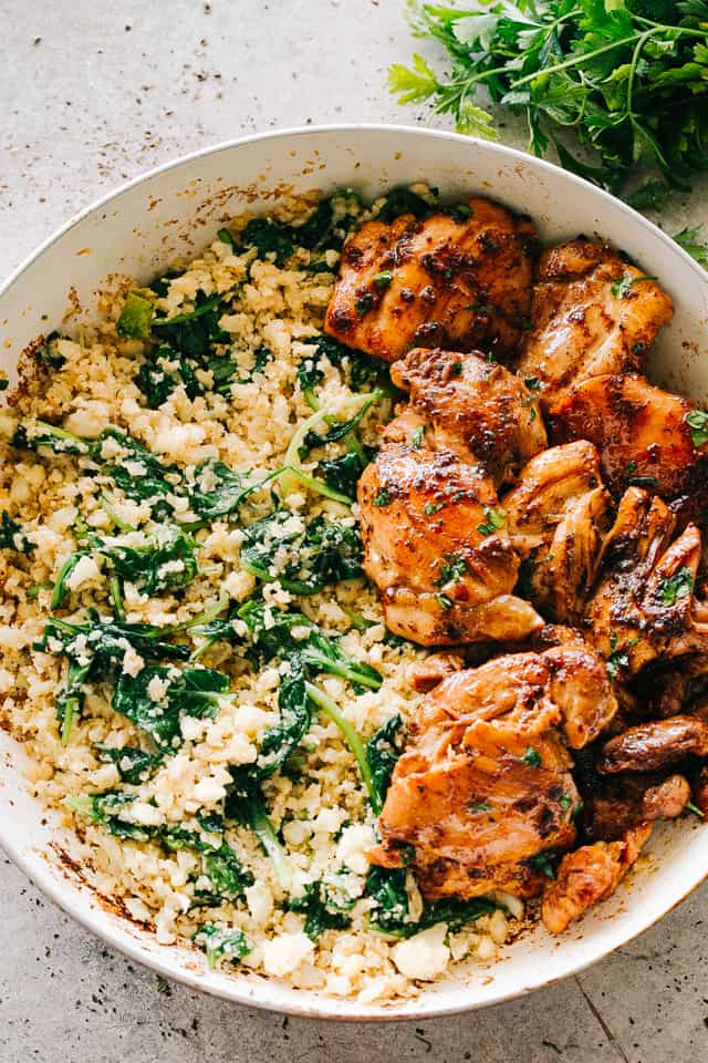 Garlic Butter Cauliflower Rice with Spinach - Easy, crunchy, incredibly flavorful Garlic Butter Cauliflower Rice is simple, healthy, and so surprisingly GOOD! 