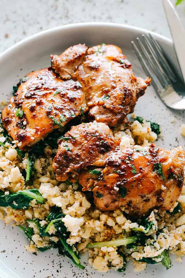 Juicy Stove Top Chicken Thighs - Perfectly golden, tender, and juicy skinless and boneless chicken thighs prepared on the stove top. These delicious pan seared chicken thighs make for a wonderful meal that's surprisingly easy, and the pan sauce is amazing!