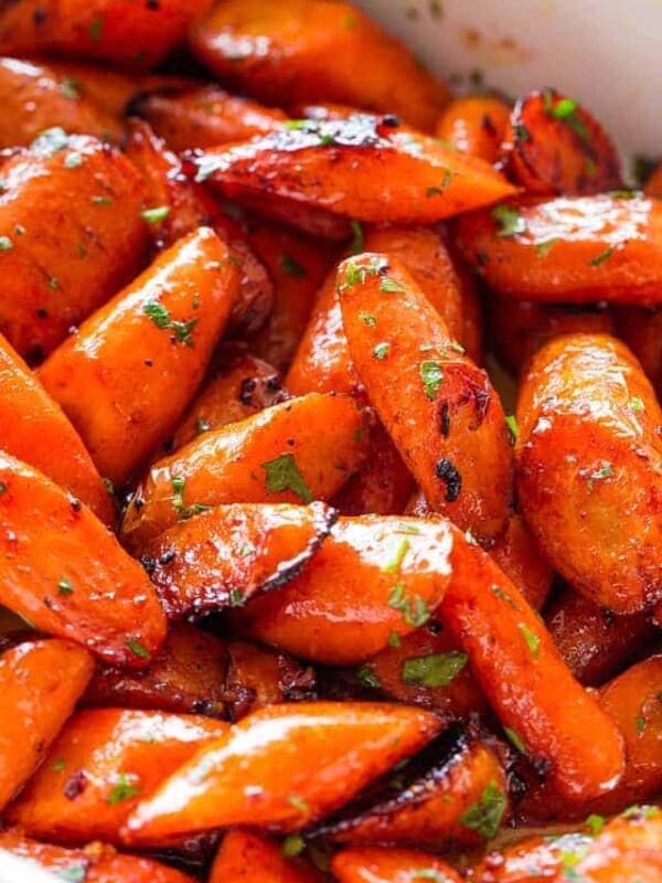 Honey Garlic Butter Roasted Carrots Recipe - Easy, simple, wonderfully delicious roasted carrots prepared with the most incredible garlic butter and sweet honey sauce.