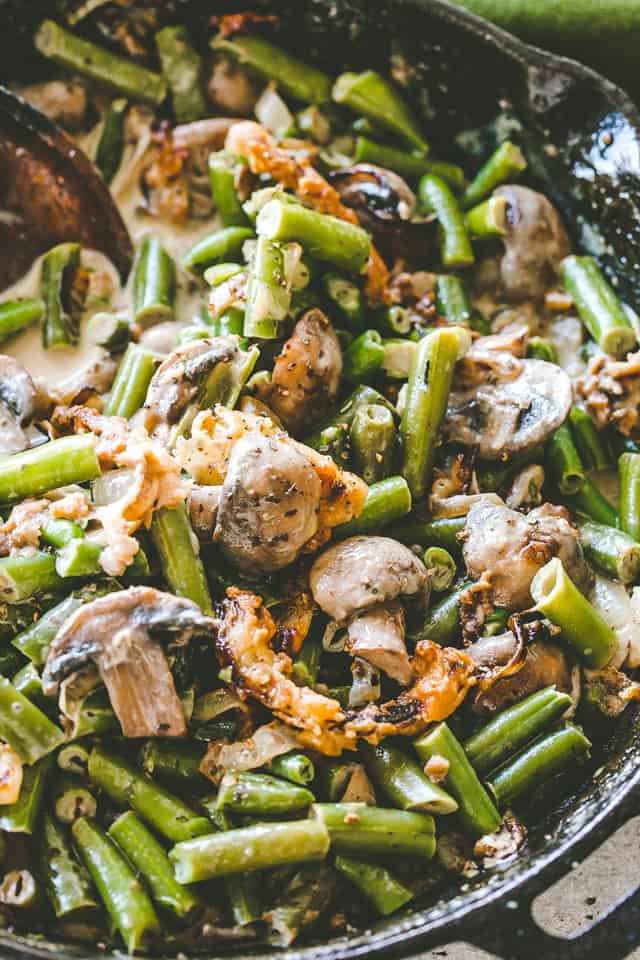 Green bean casserole filling in a skillet.