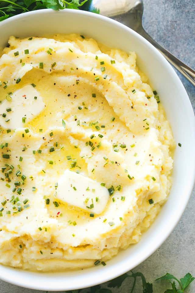 Close-up shot of Instant Pot Mashed Cauliflower with Garlic and Chives.