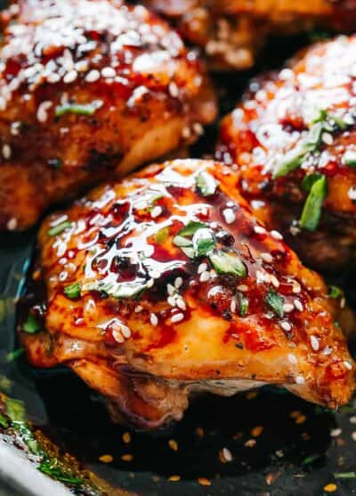 Instant Pot Sticky Chicken Thighs -  Tender, deliciously juicy, fall-off-the-bone chicken thighs prepared in the Instant Pot with a sweet and savory sticky sauce. A delicious chicken thighs recipe that's easy to make and tastes amazing!