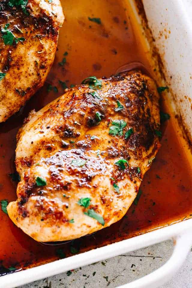 Juicy Oven Baked Chicken Breasts - Simple and easy method for how to make perfectly juicy and deliciously seasoned oven baked chicken breasts.