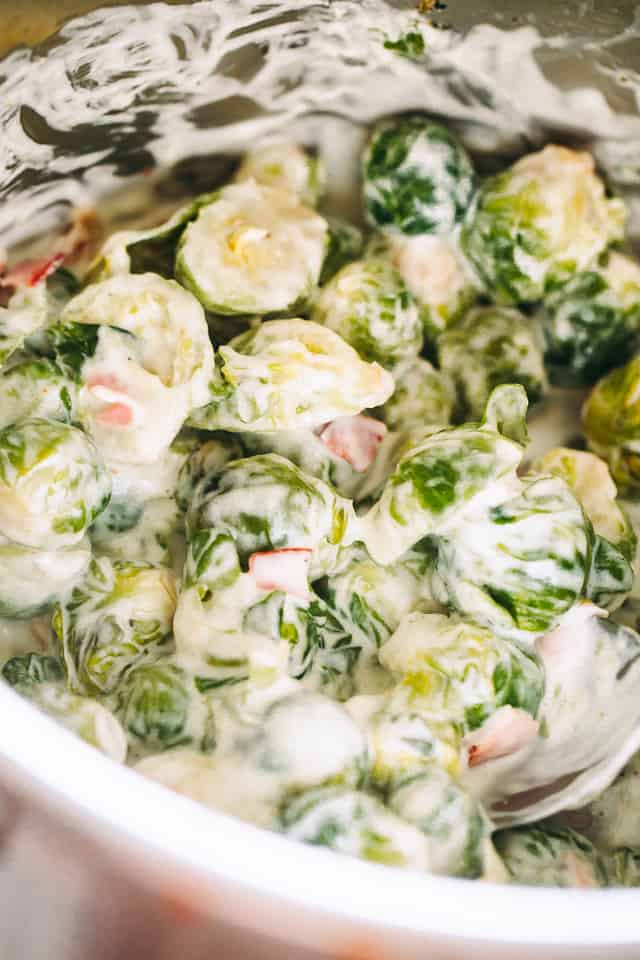 Creamy Brussel Sprouts with bacon inside an instant pot.