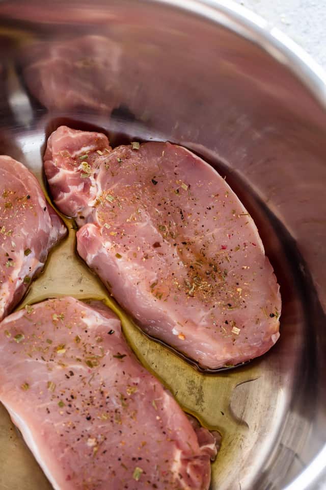 Pork chops cooking in the Instant Pot
