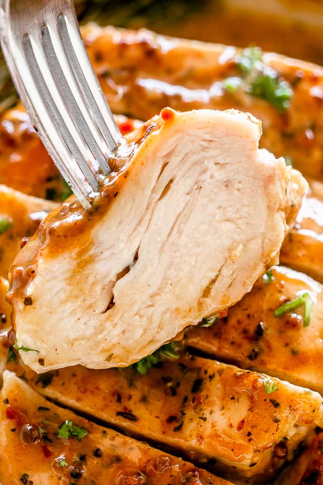 Cut up chicken breasts.