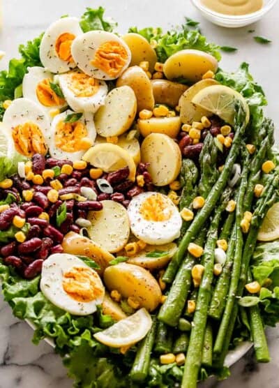 Spring salad with eggs, asparagus, potatoes, and beans.