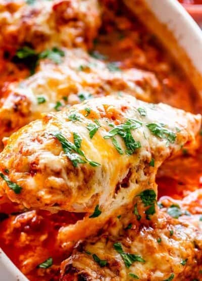 Baked chicken breasts with salsa and cheese.