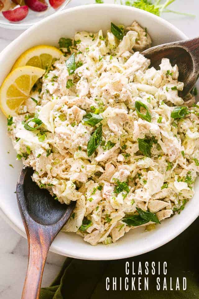 Chicken Salad in a bowl with spoons.