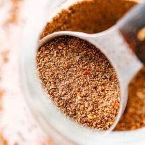 Scooping out Homemade Taco Seasoning mix.