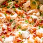 Cooking shrimp in a skillet.