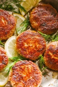 Salmon patties with dill and lemons.